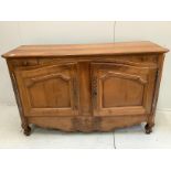 A Louis XV style carved cherry two door buffet, width 151cm, depth 53cm, height 95cm