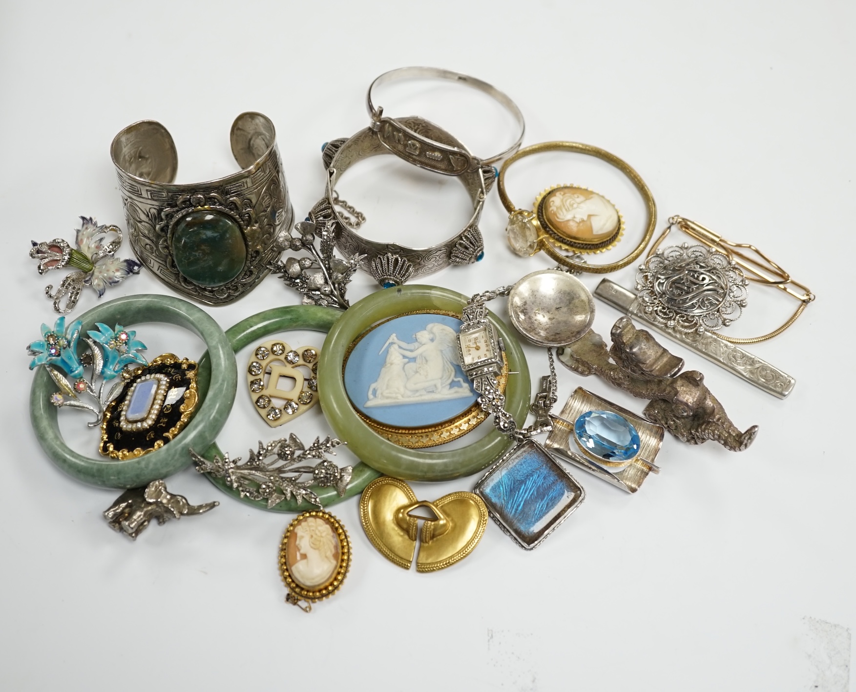 A collection of white metal and mixed costume jewellery, including bracelets, necklaces, bangles etc