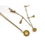 A small 9ct gold charm bracelet, hung with three assorted charms, gross weight 3 grams and a