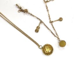 A small 9ct gold charm bracelet, hung with three assorted charms, gross weight 3 grams and a