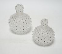 Two Lalique graduated cactus pattern glass scent bottles and stoppers, one with label to the base,