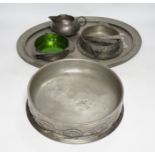 Seven items of pewter, including a Liberty Tudric tray, 45.5cm width, an Archibald Knox jug, a large