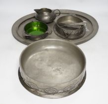 Seven items of pewter, including a Liberty Tudric tray, 45.5cm width, an Archibald Knox jug, a large