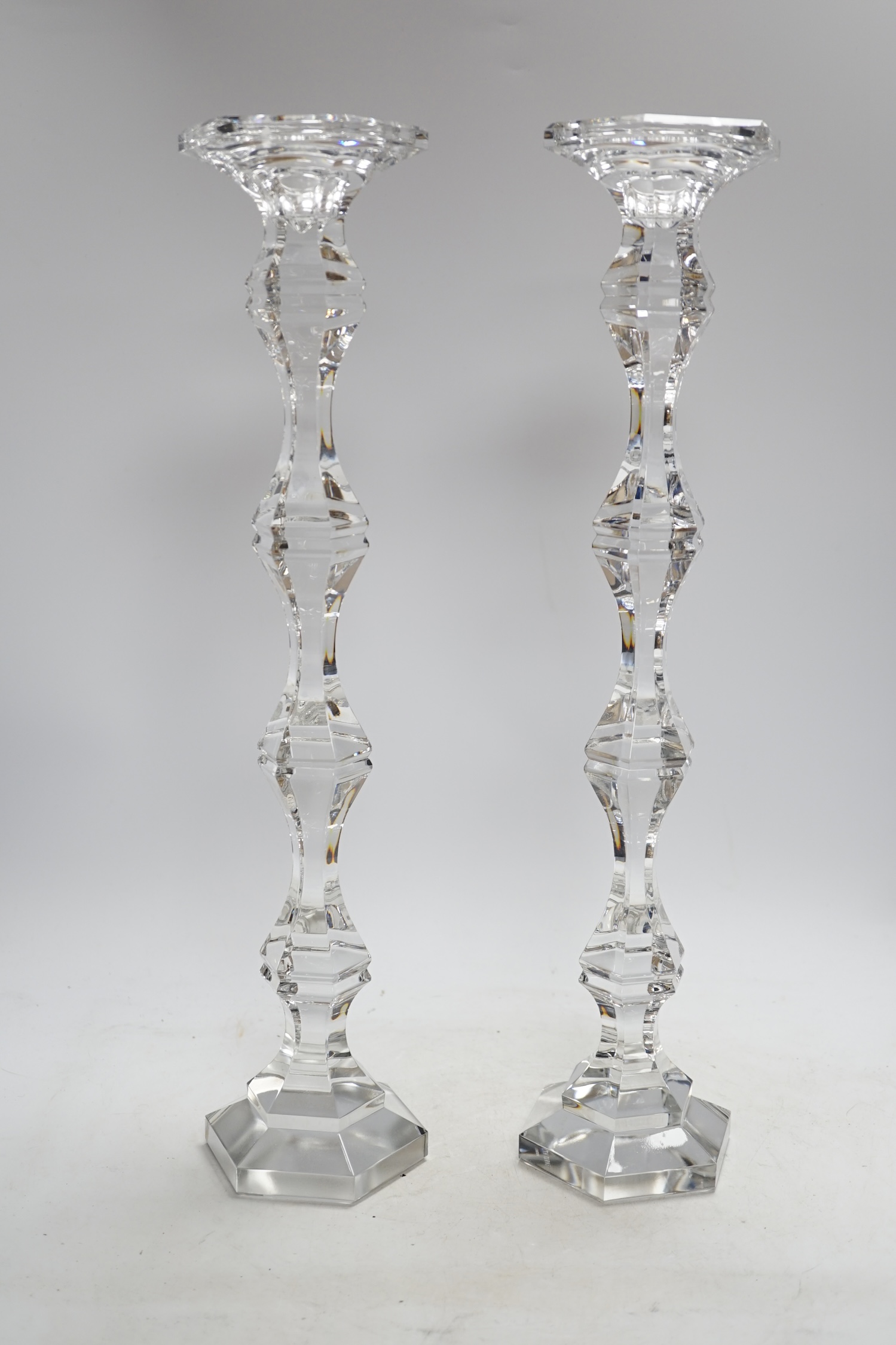 A pair of boxed tall Kenneth Turner glass candlesticks, 45.5cm