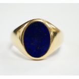 A George V 18ct gold and oval lapis lazuli set signet ring, hallmarked for Chester, 1915, size U,