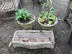 A pair of circular reconstituted stone garden planters, diameter 40cm, height 34cm, together with