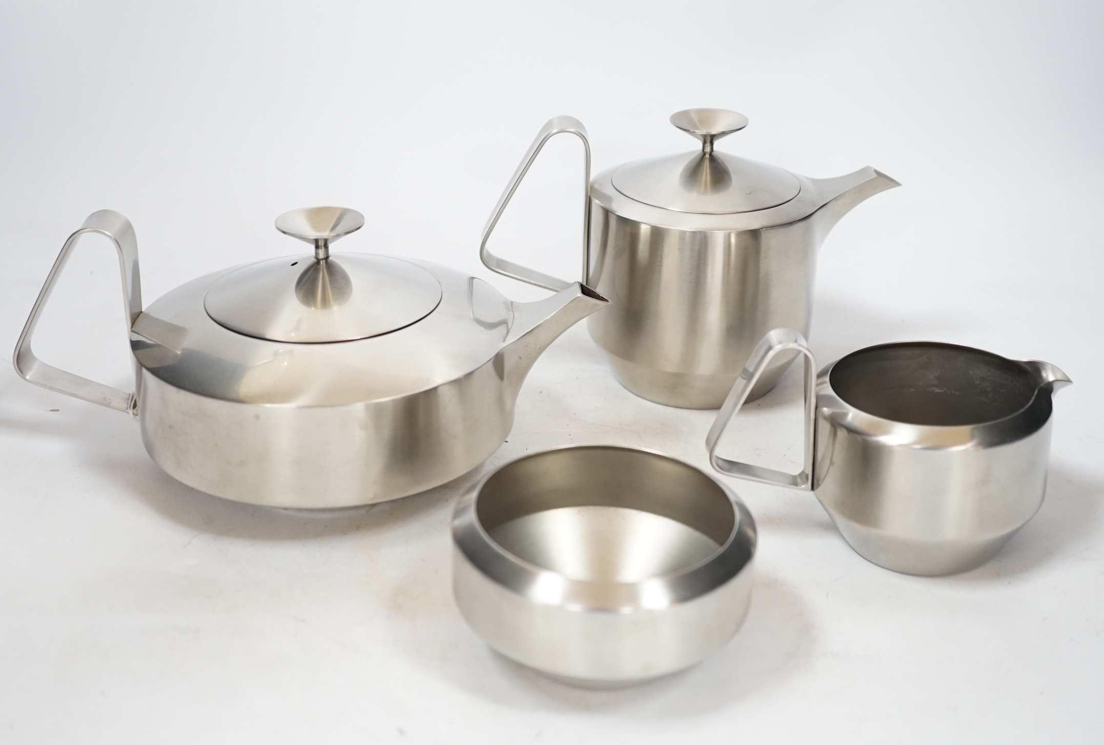An Old Hall stainless steel four piece tea set, comprising of teapot, 11cm high, water pot, milk jug