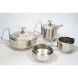 An Old Hall stainless steel four piece tea set, comprising of teapot, 11cm high, water pot, milk jug