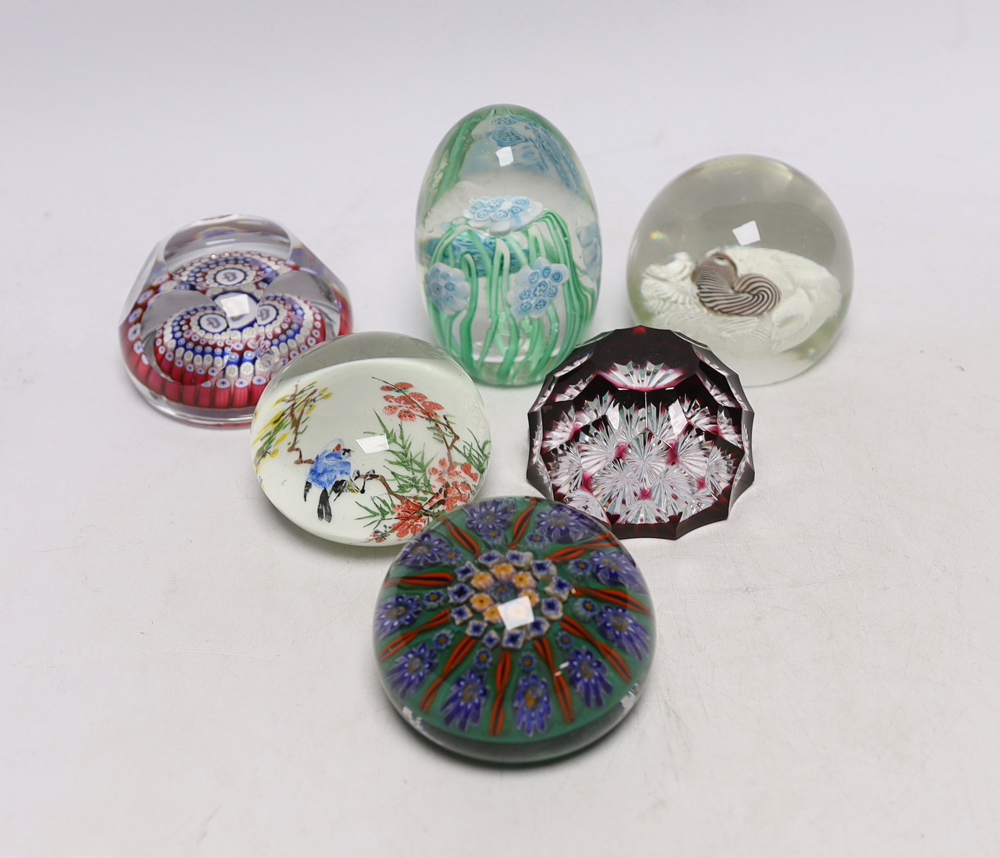 A group of six Whitefriars and other paperweights, tallest 10cm high