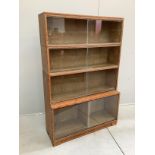 A Minty four section oak glazed bookcase, width 89cm, depth 30cm, height 134cm