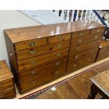 A large military style brass mounted pine twelve drawer chest, width 183cm, depth 46cm, height 97cm