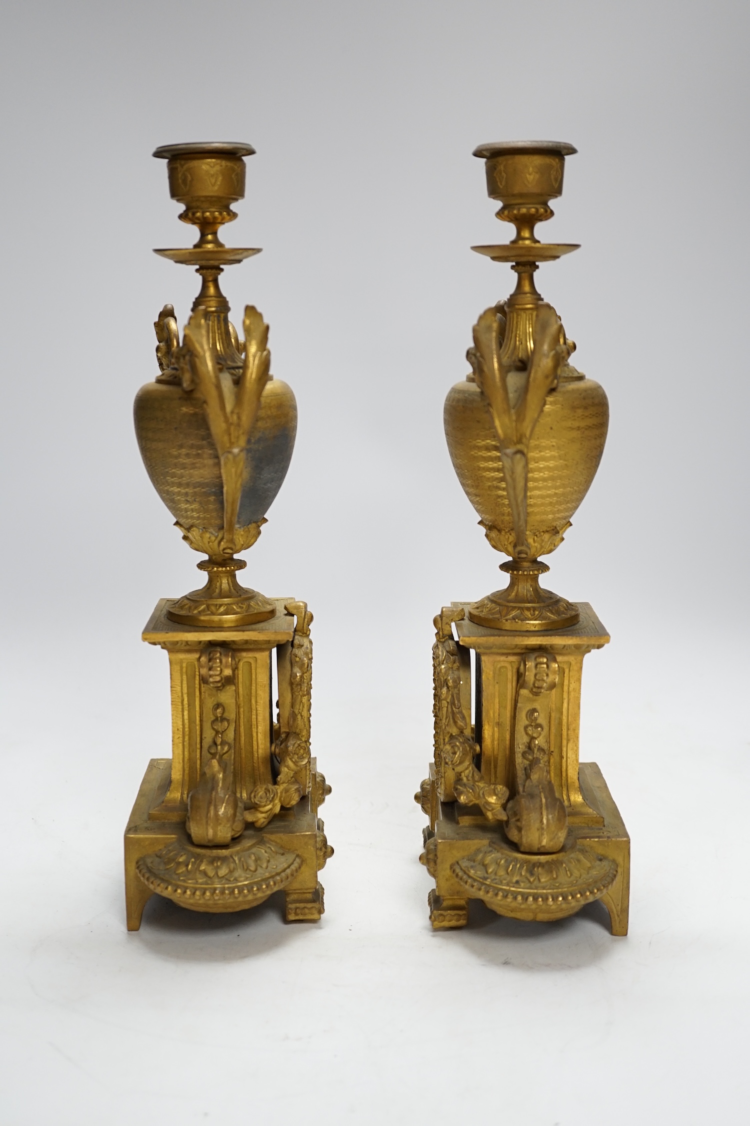 A pair of 19th century French ornamental gilt metal candlesticks, possibly clock garnitures, 32. - Image 3 of 4