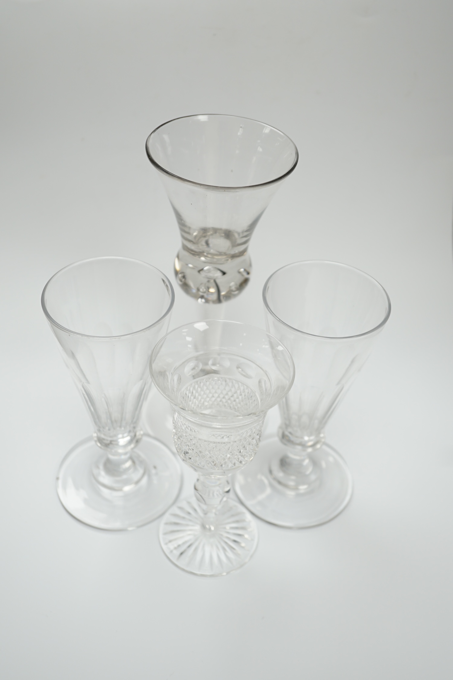 A pair of early 19th century dwarf ale glasses with fluted conical bowls, bladed knop stems and - Image 3 of 4