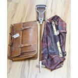 A leather Gladstone bag, an attaché case and a shooting stick