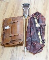 A leather Gladstone bag, an attaché case and a shooting stick