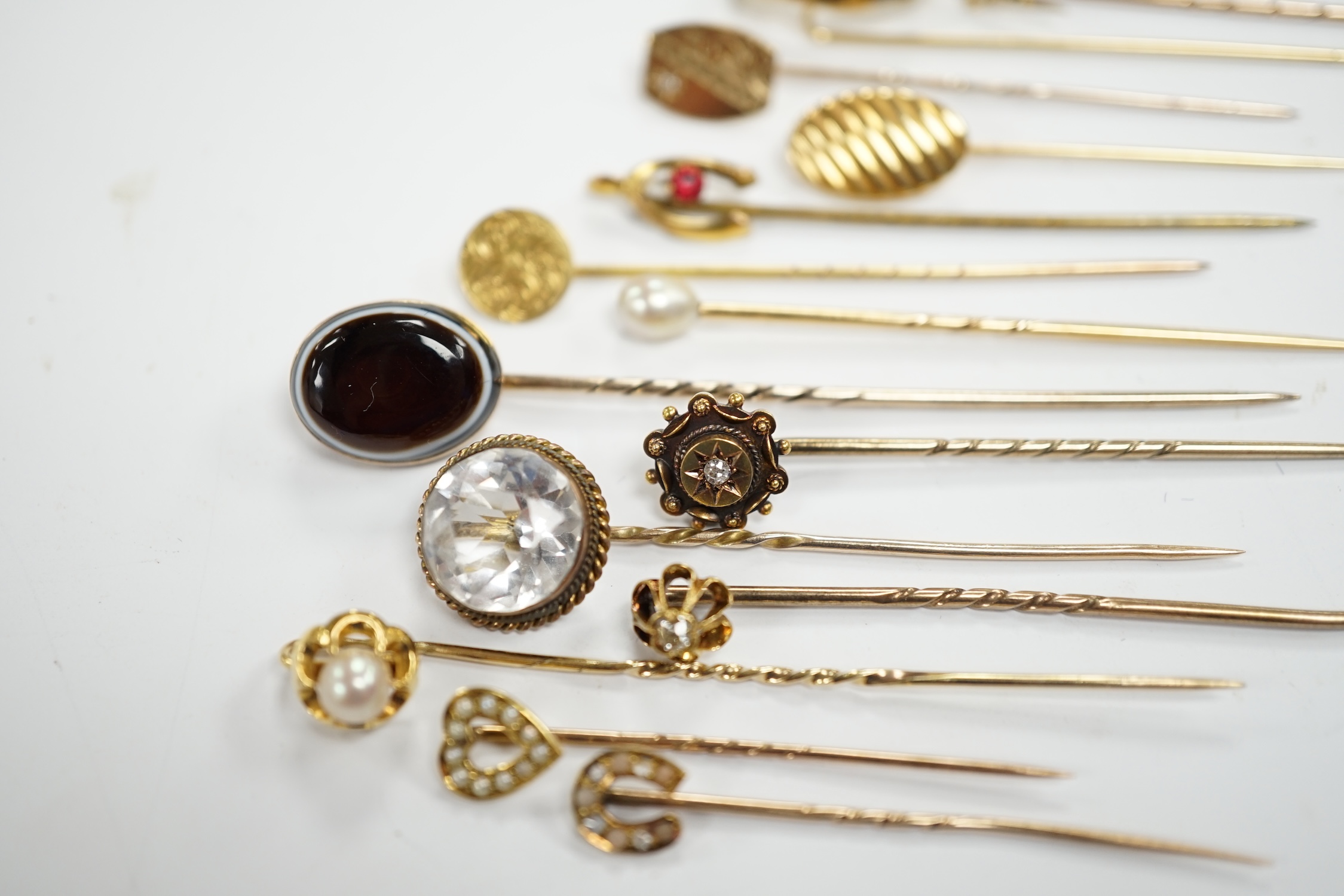 Fifteen assorted mainly early 20th century yellow metal and gem set stick pins, including diamond, - Image 8 of 11