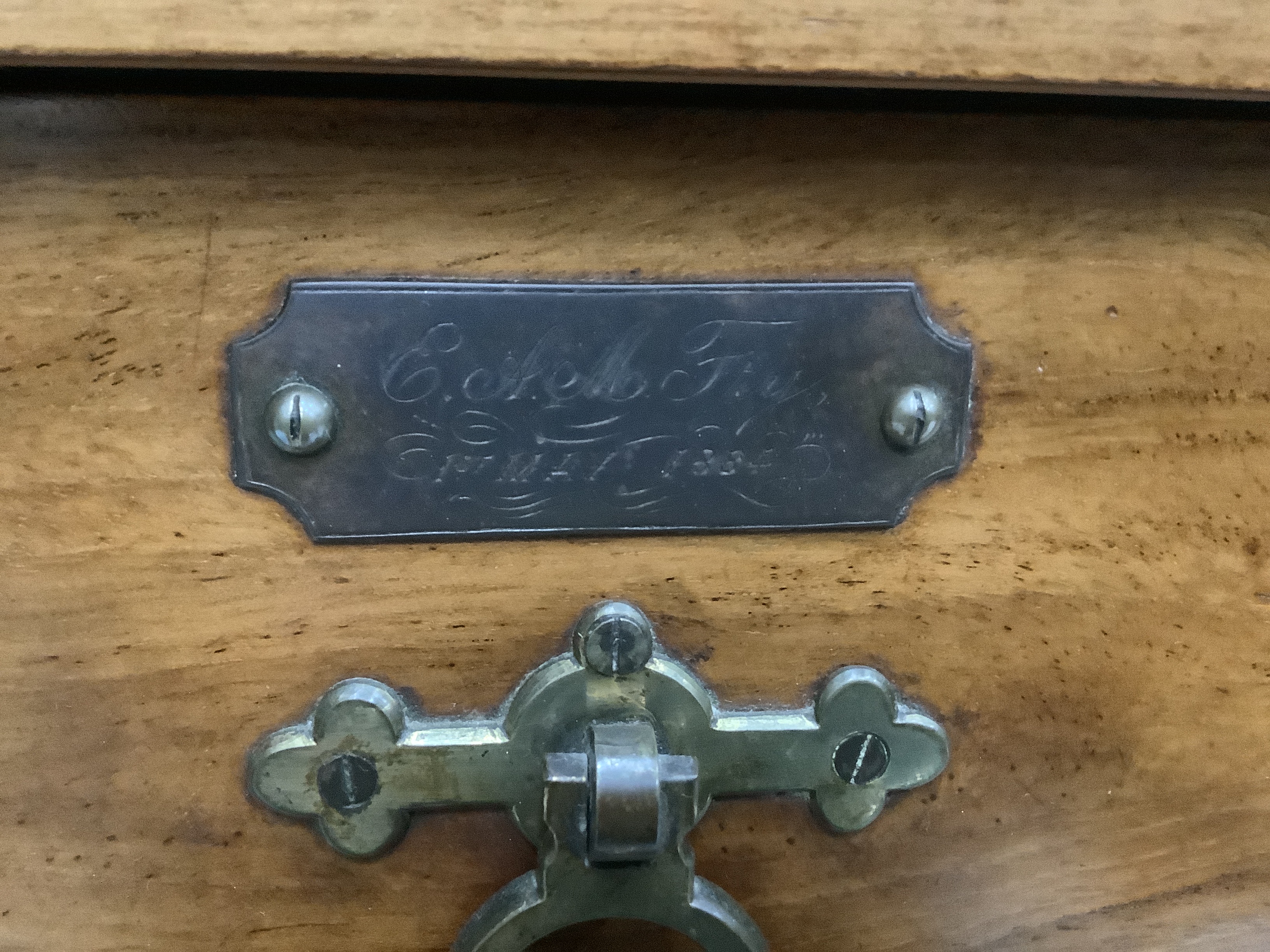 A late Victorian walnut four drawer wellington style chest, brass plaque inscribed 'E A M Fry, May - Image 3 of 3