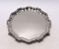 An Elizabeth II silver presentation salver, with engraved inscription and pie crust border, Viners