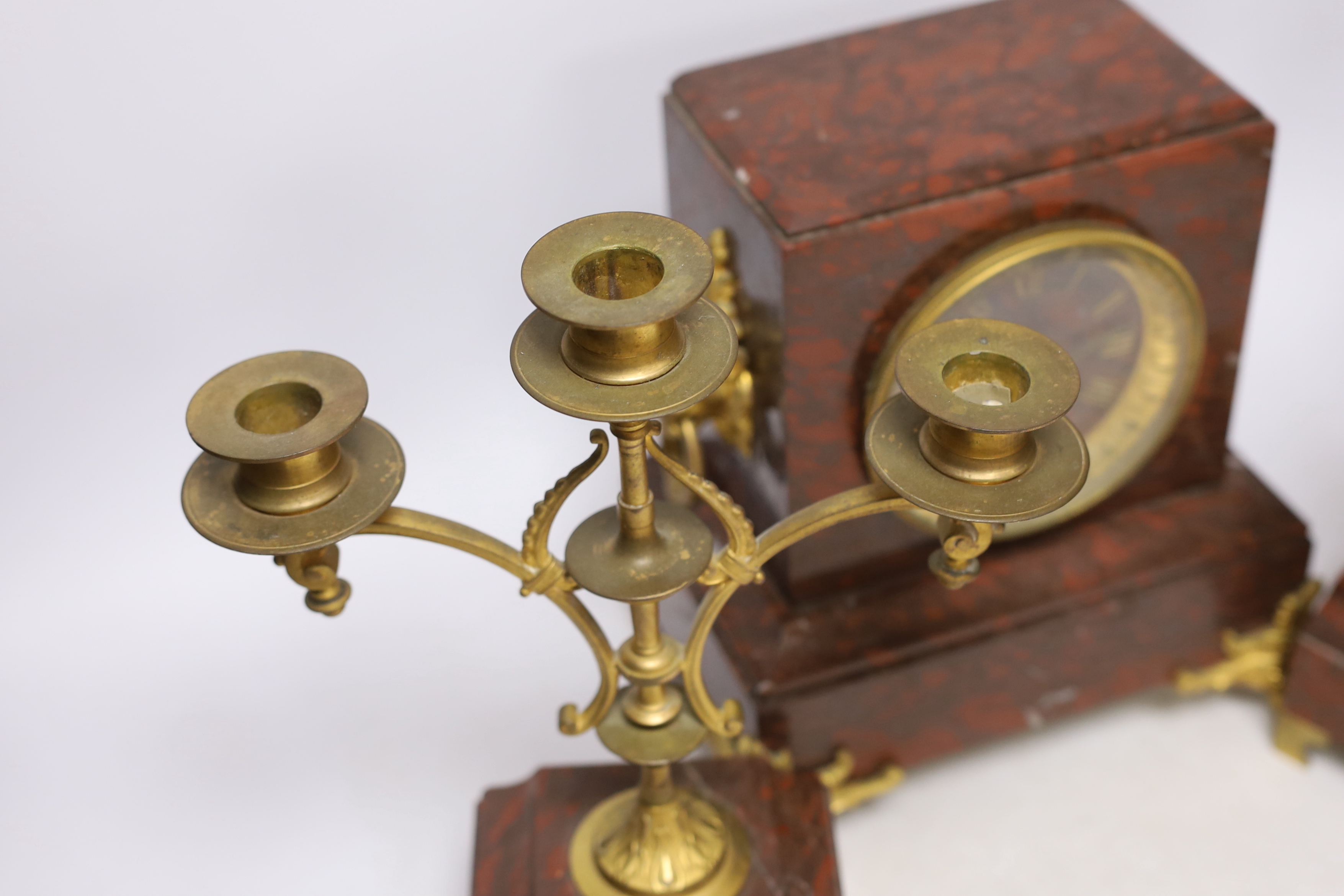 A late 19th century French rouge marble and ormolu clock garniture, 31cm - Image 3 of 6