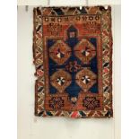 An antique Caucasian blue ground rug, 160 x 115cm