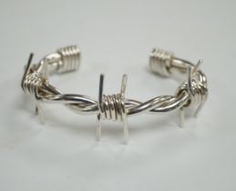 A modern silver 'barbed wire' open bangle, by M. Marlow, Edinburgh, 2006, overall width 83mm, 74