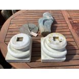 A pair of marble column bases, a sundial and a carved stone garden ornament, height 40cm