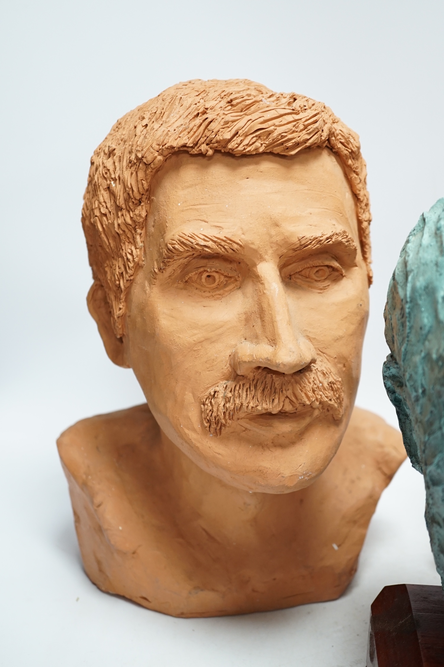 Four art pottery sculpted heads on stands, two terracotta and two painted verdigris green, largest - Image 4 of 5