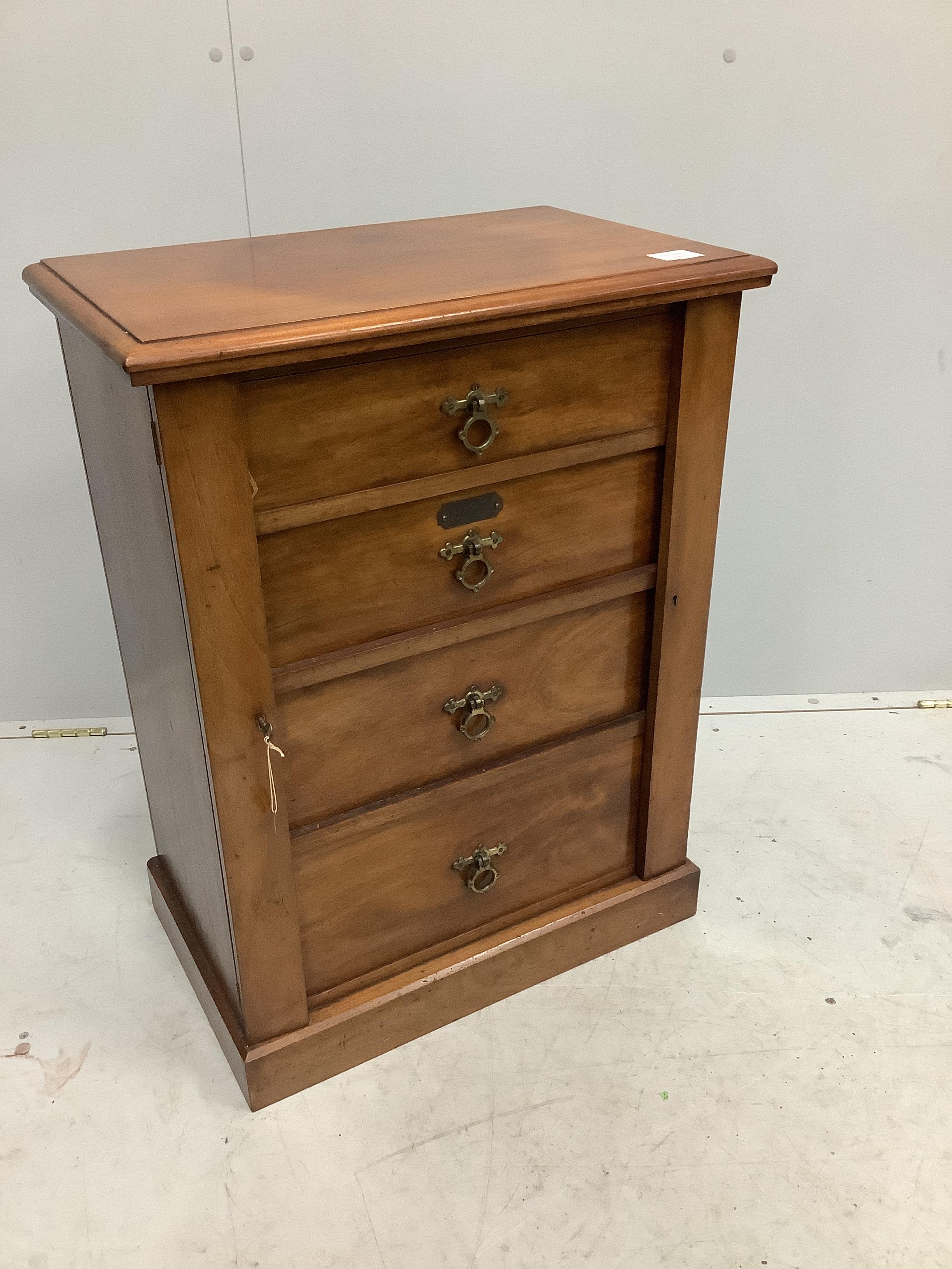 A late Victorian walnut four drawer wellington style chest, brass plaque inscribed 'E A M Fry, May