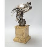 A silvered bronze falcon and serpent group, on marble pedestal, 37cm