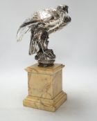 A silvered bronze falcon and serpent group, on marble pedestal, 37cm