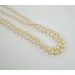 A 1930's twin strand graduated cultured pearl necklace, with 14ct, plat and diamond chip set