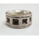 A carved heavy gauge white metal ring, thought to be of Viking origin?, size Q/R, 31.8 grams.