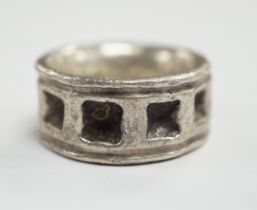 A carved heavy gauge white metal ring, thought to be of Viking origin?, size Q/R, 31.8 grams.
