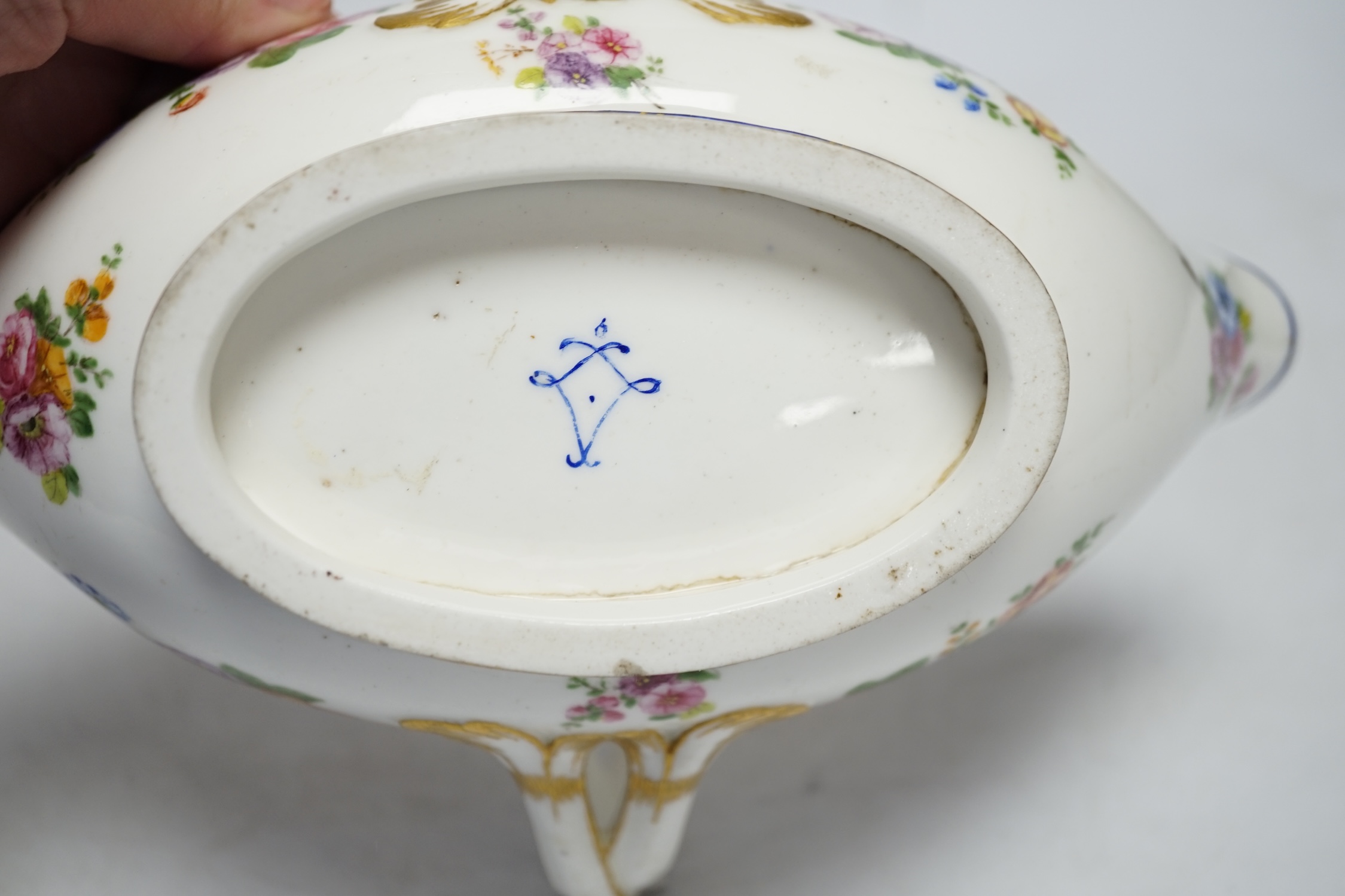 An 18th century Sevres sauceboat, probably later enamelled with flowers, 23.5cm wide - Image 5 of 5