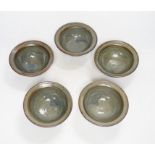 Five Studio pottery bowls, with Henry Hammond Potter's stamp to base