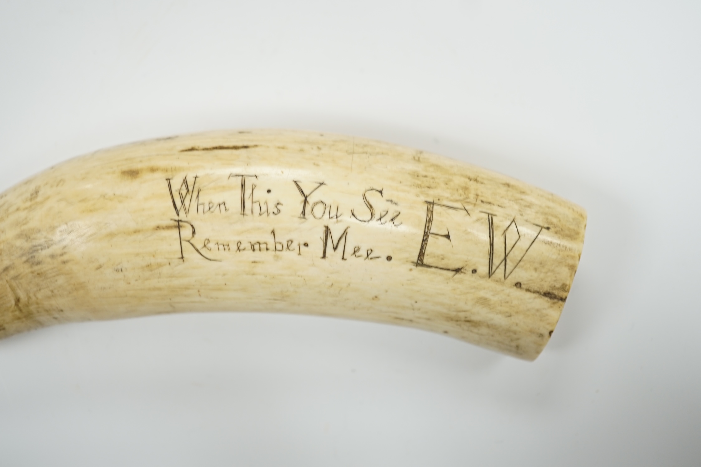 A 19th century Scrimshaw walrus tooth with carved motto ‘When this you see, remember mee’ and - Image 2 of 4