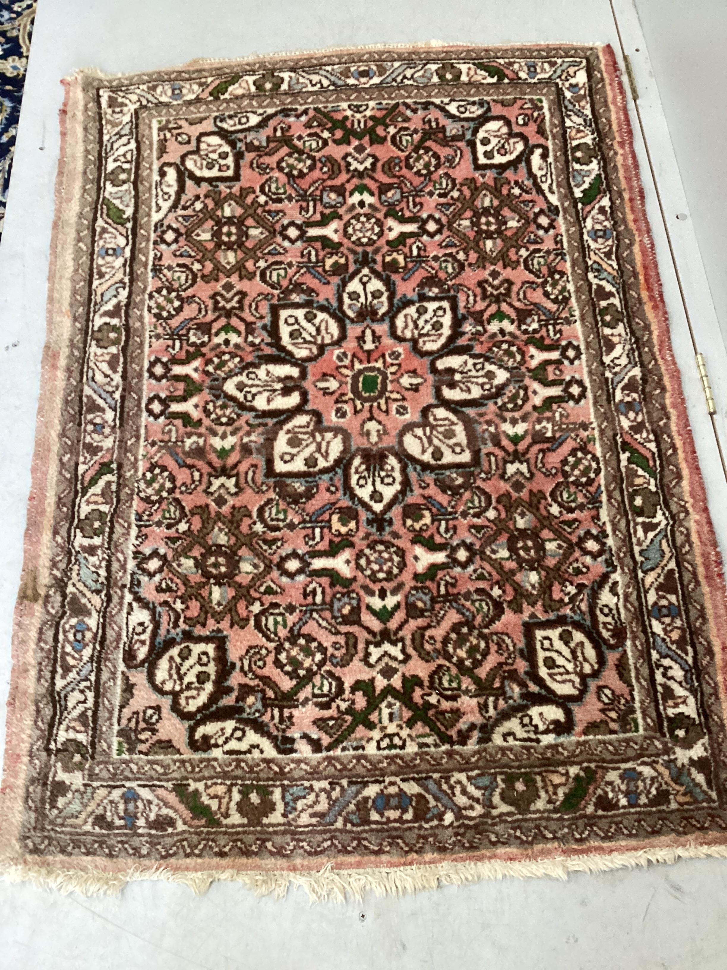A North West Persian peach ground rug, 148 x 100cm