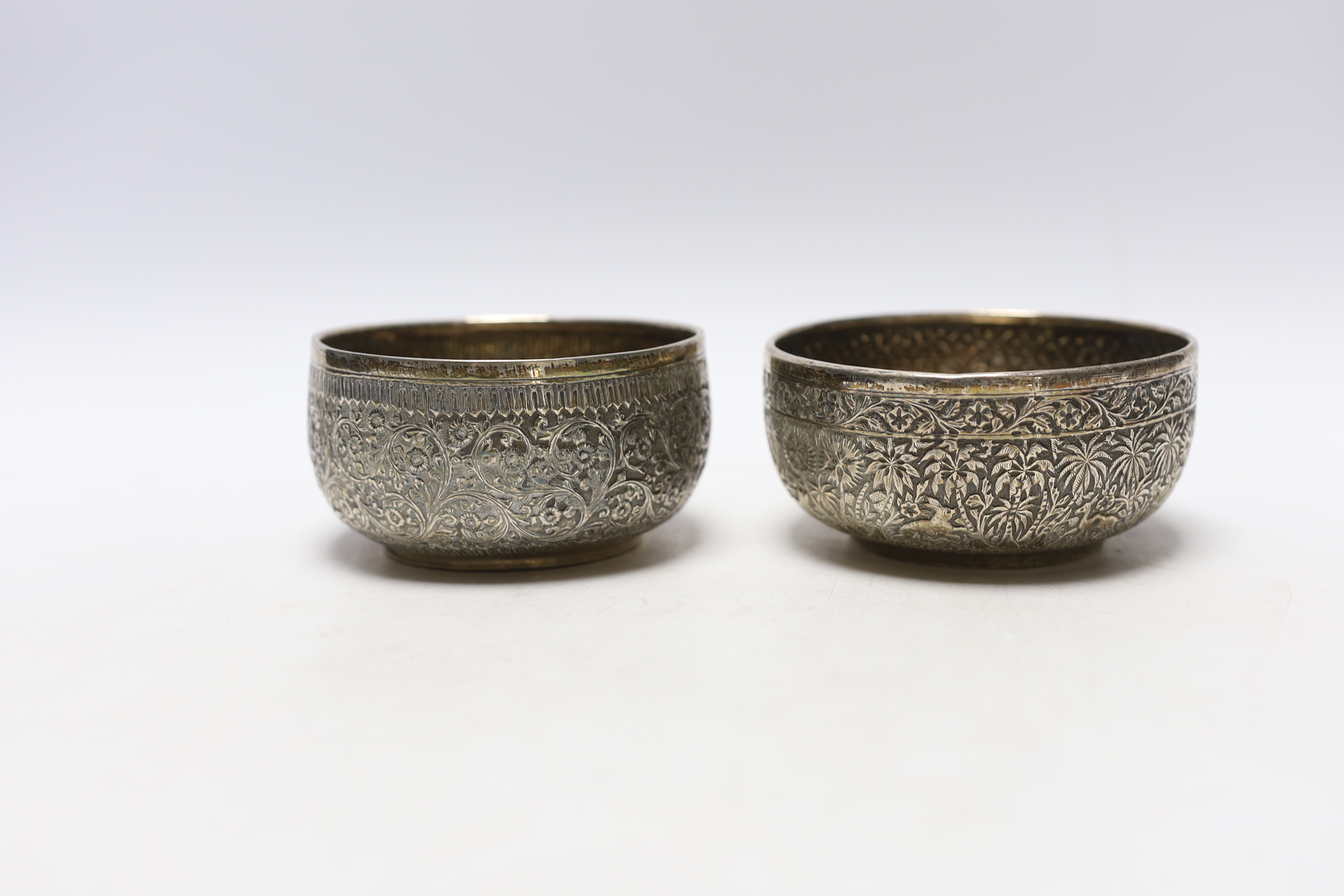 A pair of Indian embossed white metal finger bowls, 10cm, 7.5oz. - Image 2 of 4