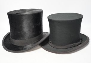 A brown leather top hat case together with a black silk collapsible top hat/opera hat and another,