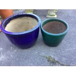 Two large circular glazed pottery garden planters, larger diameter 51cm, height 40cm