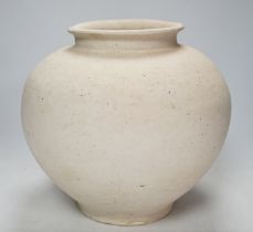 A Chinese pottery ovoid jar, Tang dynasty, 24cm