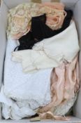 A collection of 1900-1940's ladies petticoats and cami's