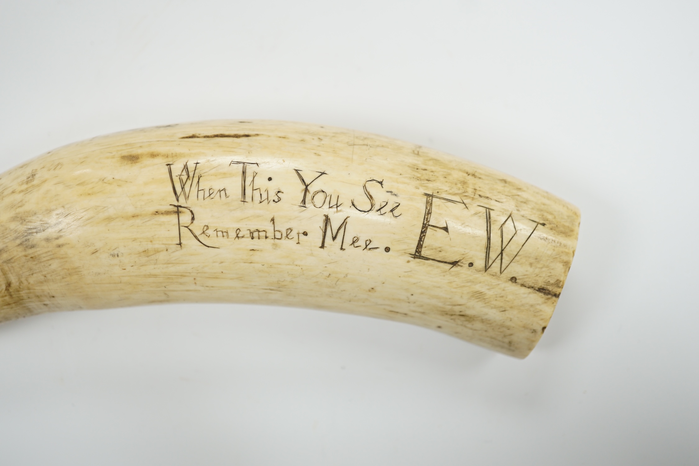 A 19th century Scrimshaw walrus tooth with carved motto ‘When this you see, remember mee’ and - Image 3 of 4