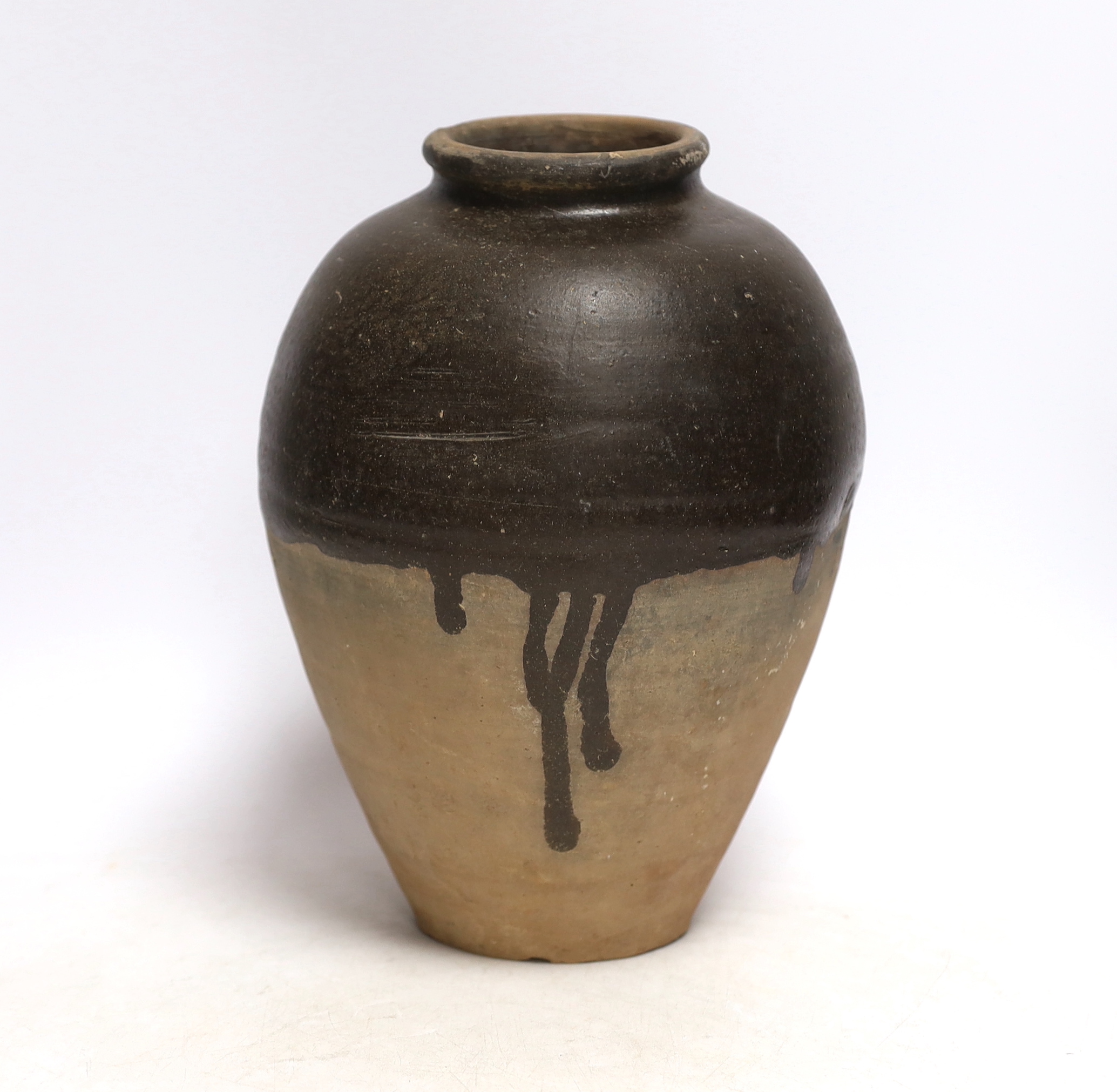 A Chinese brown partially glazed jar, Tang dynasty, 26cm