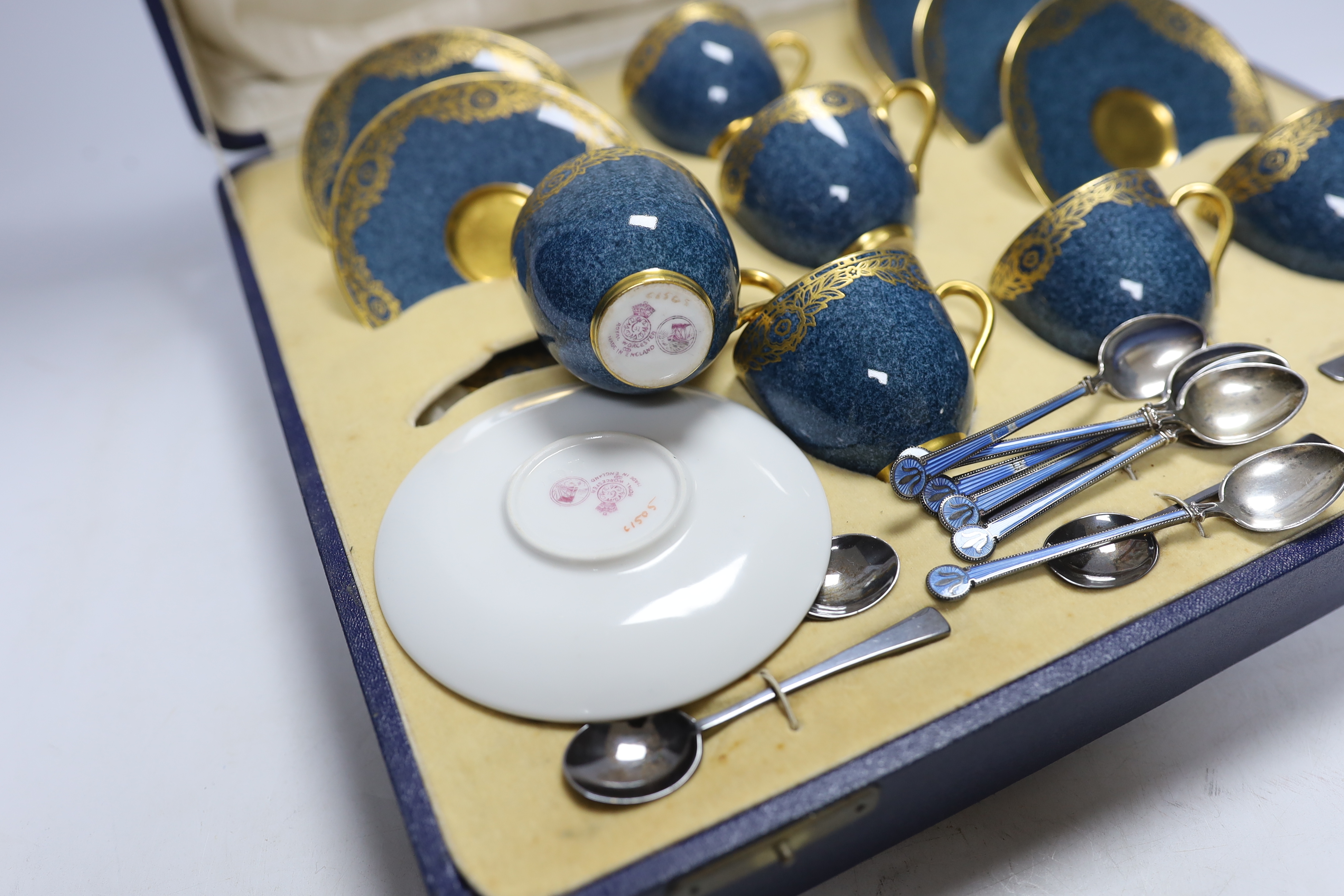 A cased Royal Worcester gilt and powder blue six piece coffee set with silver teaspoons, set of - Image 4 of 4