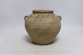 A Chinese grey pottery jar, Han dynasty, 19cm high