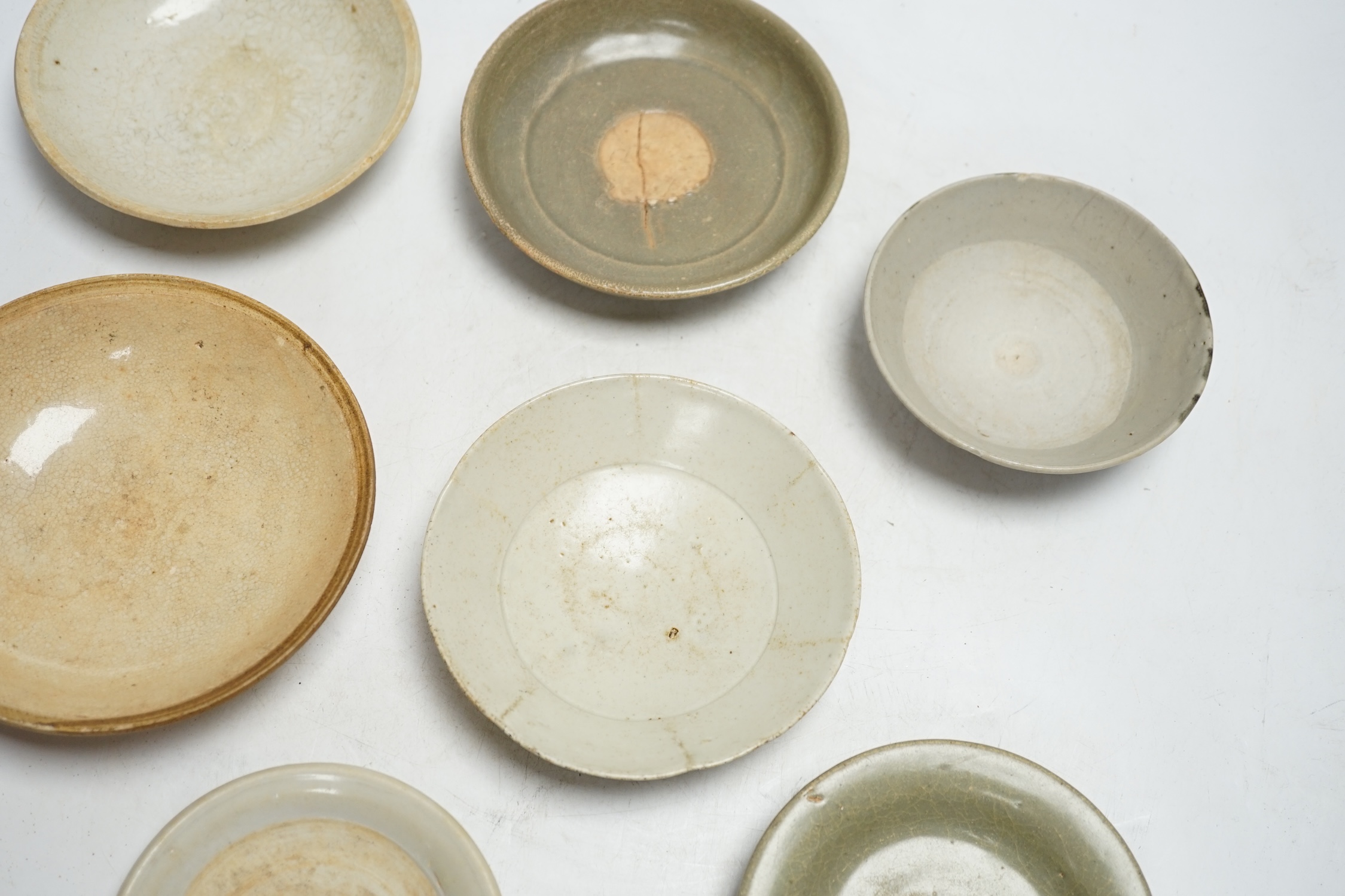 A group of seven Chinese Ding type, qingbai and celadon dishes, Song-Yuan dynasty, largest 15.5cm - Image 3 of 5