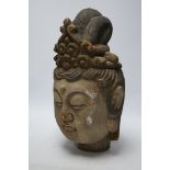 A Chinese painted wood head of Guanyin, Yuan style, 40cm