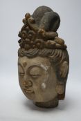 A Chinese painted wood head of Guanyin, Yuan style, 40cm