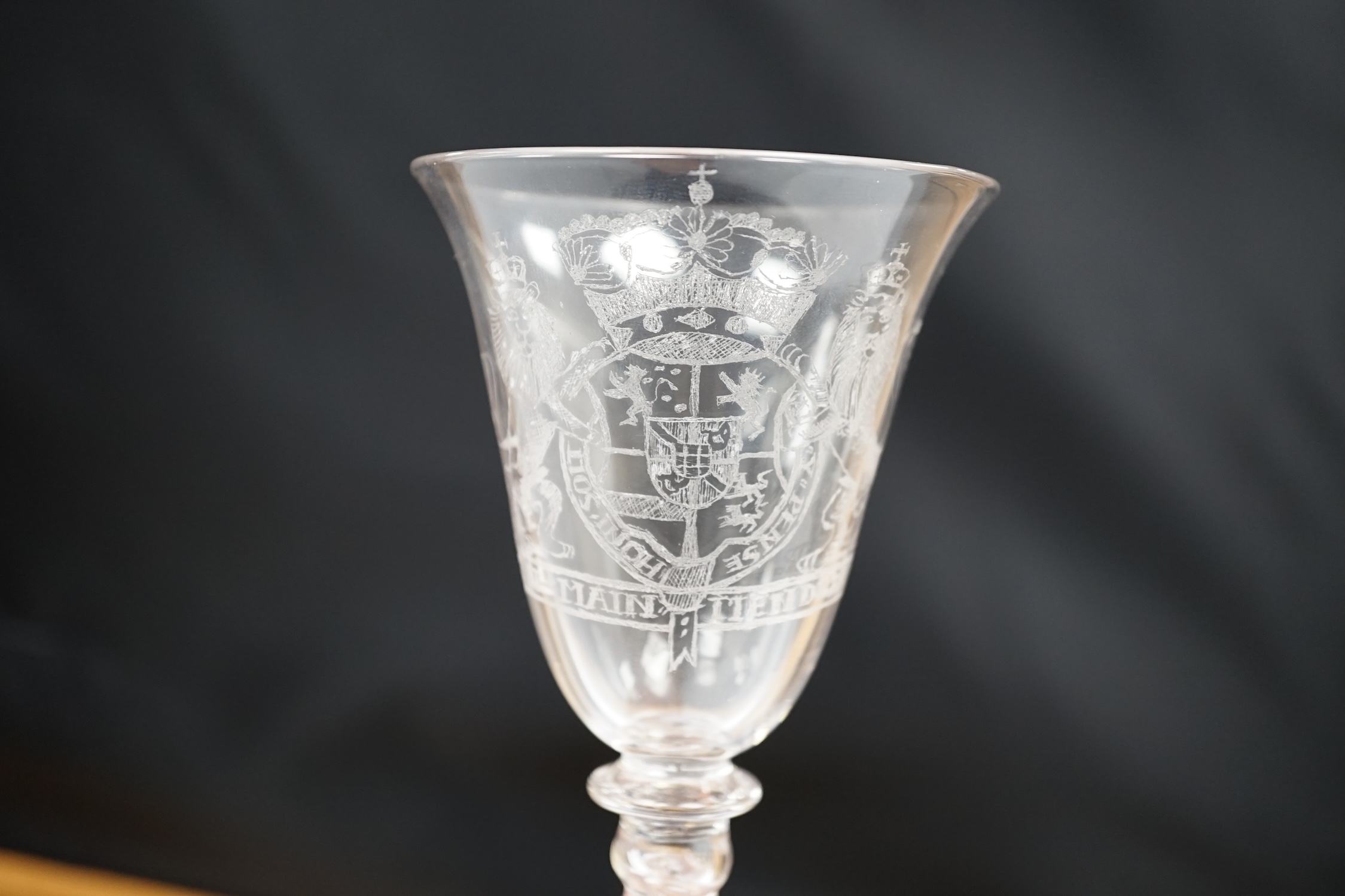An 19th century diamond point engraved armorial glass, with knopped stem, air tears and rough - Image 2 of 5